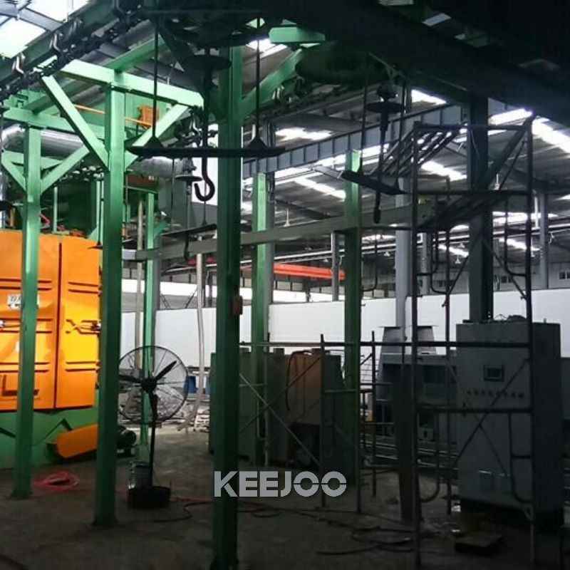 Catenary Stepping Q48 Monorail Shot Blasting Machine For Casting Forging Parts